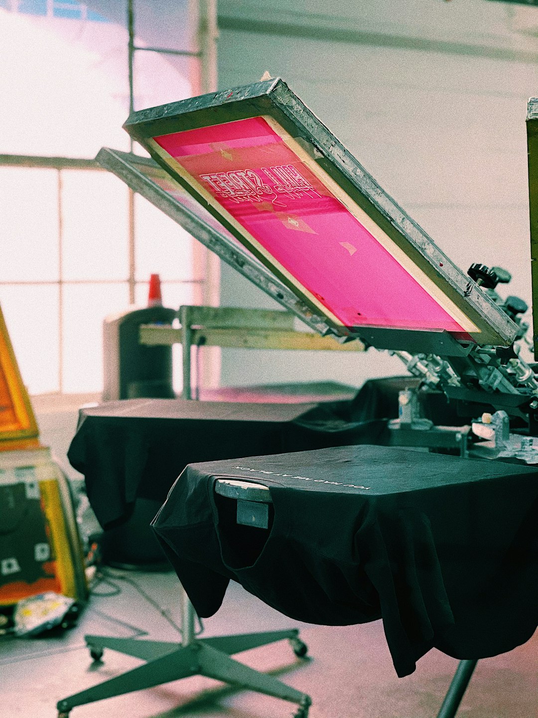 black-flat-screen-tv-turned-on-on-black-table-zqpekftkimw